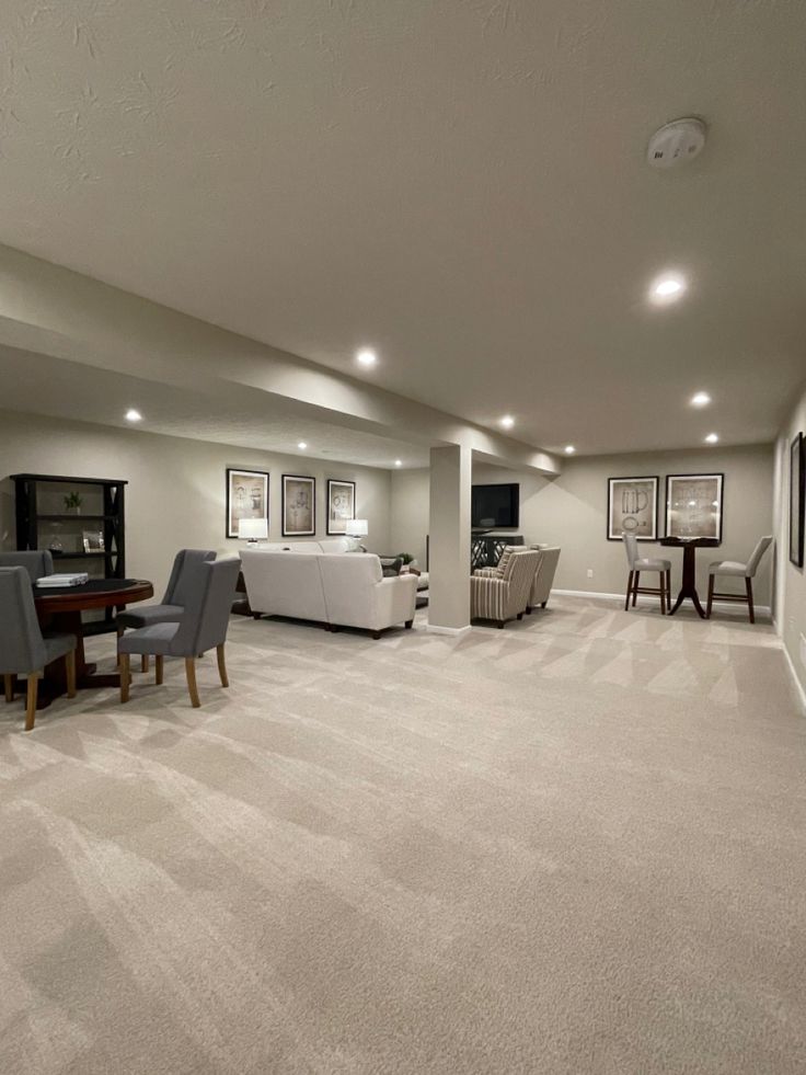 Finished basement renovation with warm lighting and oak flooring in an Etobicoke semi-detached home